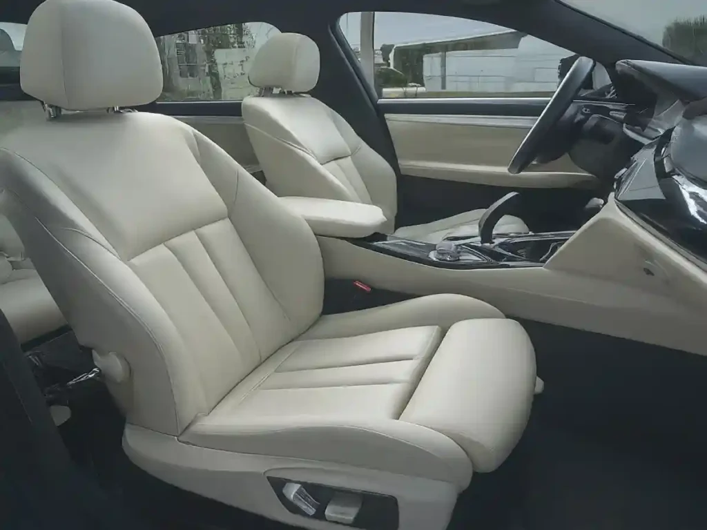 interior of BMW with white Dakota Leather upholstery